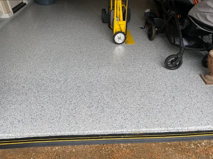 This is a medium distance photo of Epoxy Resin Garage floor 