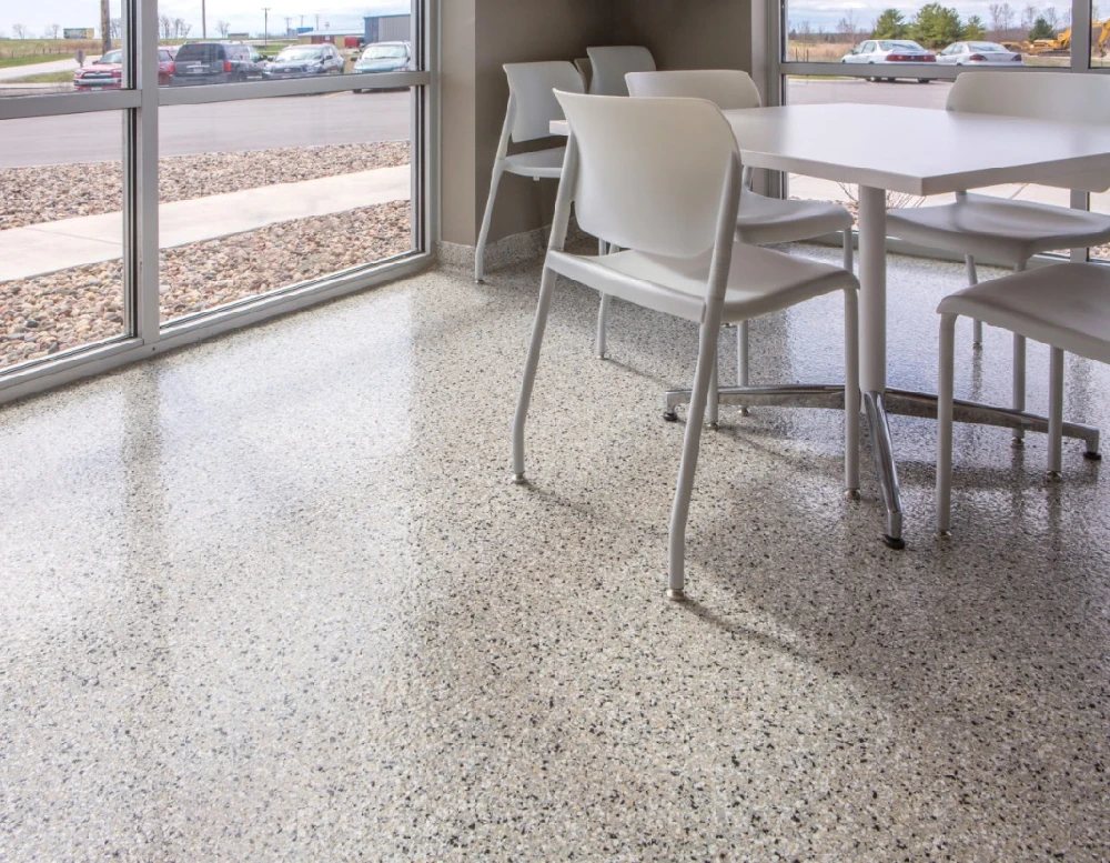 This is a picture of a polymer flake floor in a business building break room